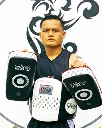 Kru Chuy, coach