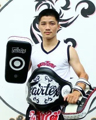 Kru Poye, coach